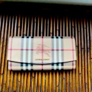 Authentic Burberry Wallet. Signature Cloth Exterior. Serious offers only.